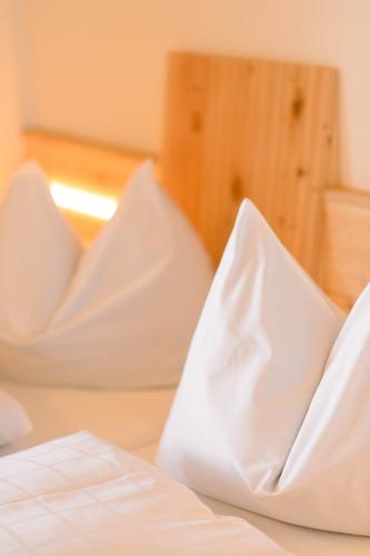 Ένα ή περισσότερα κρεβάτια σε δωμάτιο στο Hotel Restaurant Waldbichl