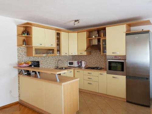 O bucătărie sau chicinetă la House Kajfes