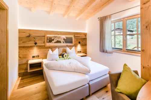 Cama o camas de una habitación en Beim Hochfilzer Superior 4 Sterne