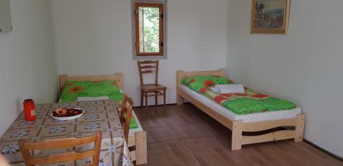 Ένα ή περισσότερα κρεβάτια σε δωμάτιο στο Wodolenka