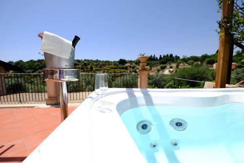 a bath tub with a face drawn on it at Domus Hyblaea Resort in Palazzolo Acreide