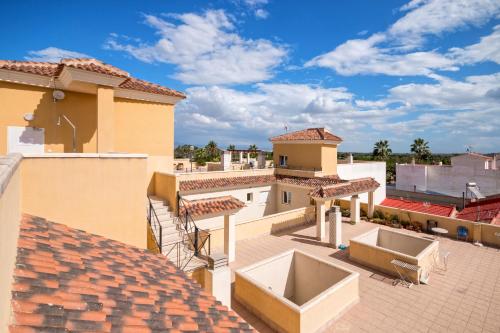 a view from the roof of a building at Residential jardín del pintor - la casa amarilla in Jacarilla
