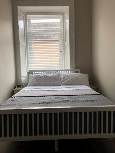 Llit o llits en una habitació de Am Meadhan - Comet Apartments