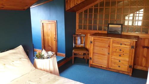 Postel nebo postele na pokoji v ubytování Chalet nelle vigne