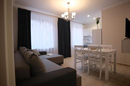 Posezení v ubytování Central Apartament II