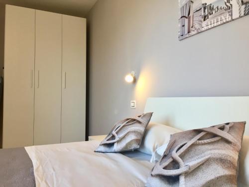 Katil atau katil-katil dalam bilik di Le Domus Modern Apartments Cagliari