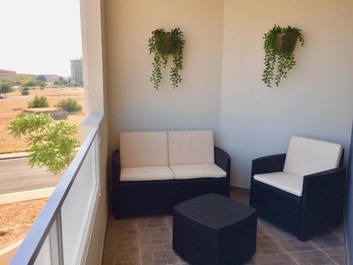 Ruang duduk di Le Domus Modern Apartments Cagliari