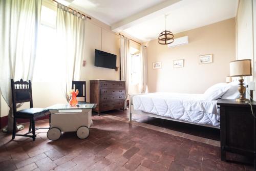 Postel nebo postele na pokoji v ubytování Agriturismo Villa Cavallini