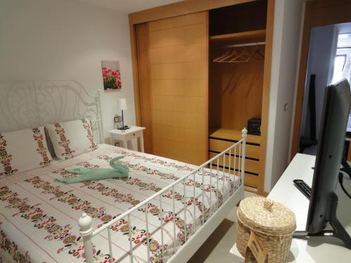 Postel nebo postele na pokoji v ubytování Bungalow Villa Sun