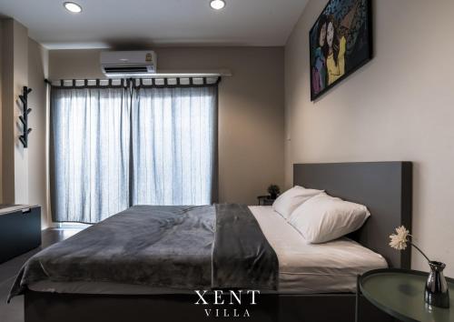 Katil atau katil-katil dalam bilik di Xent Pool Villa Ranong