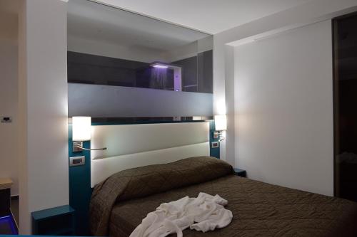 Cama o camas de una habitación en Reginna Palace Hotel