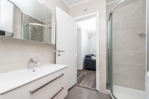 Kúpeľňa v ubytovaní Apartments Janice