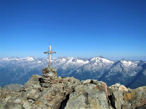 a cross on the top of a mountain at Residence Aichner in Brunico