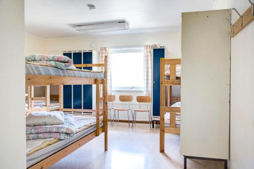En eller flere senge i et værelse på STF Vandrarhem Sälen