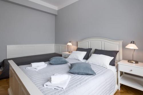 
Łóżko lub łóżka w pokoju w obiekcie Florianska Deluxe Apartments with Air Condition
