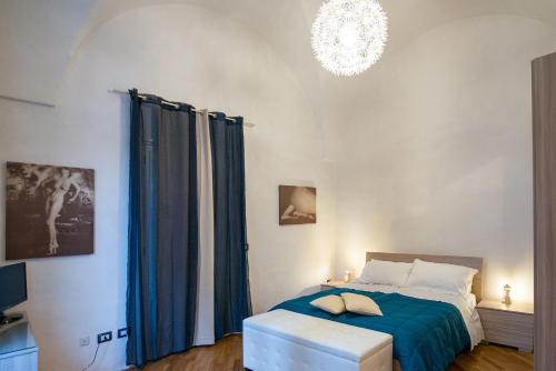 Postel nebo postele na pokoji v ubytování B&B IL SEGRETO