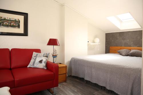 מיטה או מיטות בחדר ב-Ferienhaus Witte Huuske