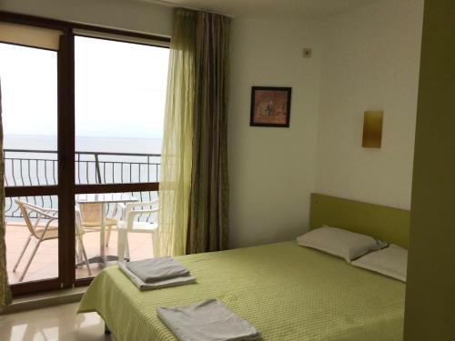 Llit o llits en una habitació de Apartment Slantse