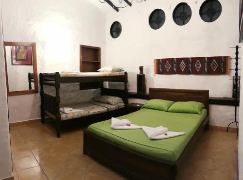 a bedroom with two bunk beds in a room at Casa Constantino in Rivera