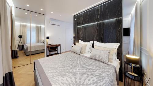 Posteľ alebo postele v izbe v ubytovaní Illyria Luxury Studio Apartments