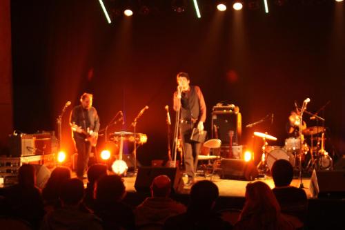 a group of musicians on a stage in front of a crowd at Camping Au Coeur de Vendome in Vendôme