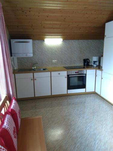 Una cocina o zona de cocina en Haus Schwärzler - Säntisblick