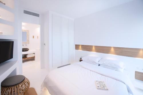 Posteľ alebo postele v izbe v ubytovaní Phos Home by Rocks Estates
