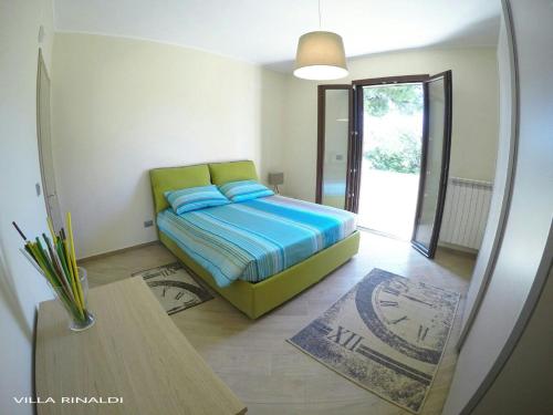 Posteľ alebo postele v izbe v ubytovaní Villa RINALDI
