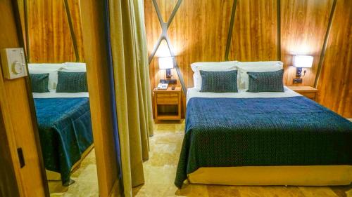 Extenso Hotelにあるベッド