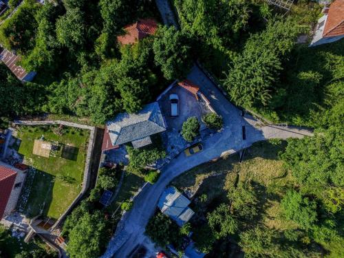 an overhead view of a house with a road at Filoxenia- Drakia in Drakeia