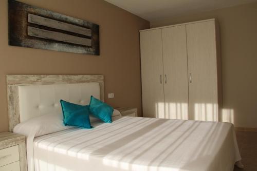 Postel nebo postele na pokoji v ubytování Rivera Del Tirón Apartamentos