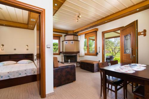 Posteľ alebo postele v izbe v ubytovaní Semiramis Cottage