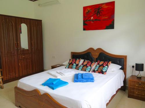 Giường trong phòng chung tại Fadine Self Catering