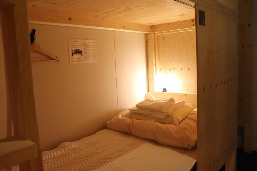Postel nebo postele na pokoji v ubytování Hostel Tomar