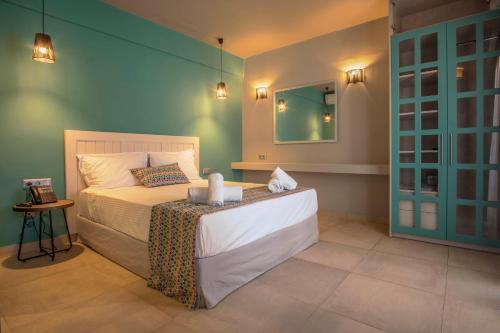 A bed or beds in a room at Armeno Resort