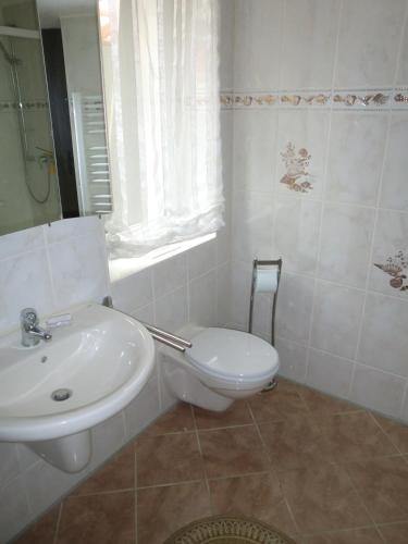 Ein Badezimmer in der Unterkunft Wildholz Sachsen