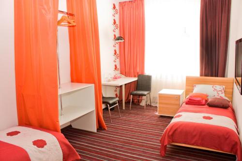 Postel nebo postele na pokoji v ubytování Hotel Kalyna
