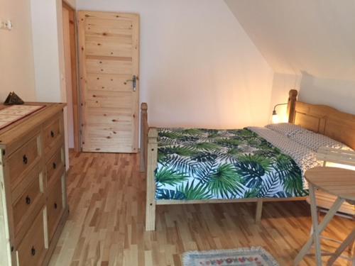 Postel nebo postele na pokoji v ubytování Chata Bieszczady