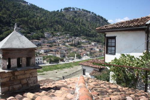 a view of a town from the roof of a building at Hani i Xheblatit in Berat