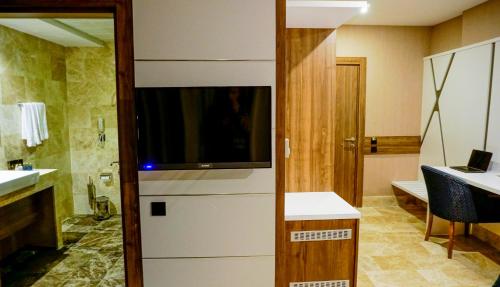 Koupelna v ubytování Extenso Hotel
