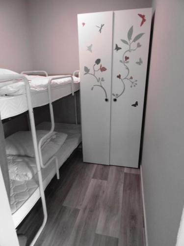 Postel nebo postele na pokoji v ubytování Domaine "Les Hochets
