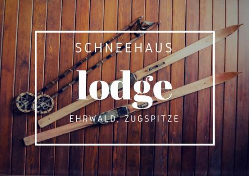 a sign that reads sustainable lodge on a wooden wall at Schneehaus Lodge in Ehrwald