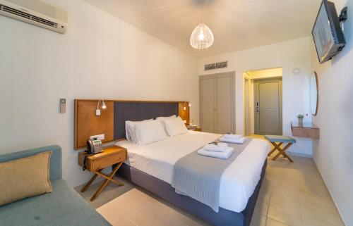 Ένα ή περισσότερα κρεβάτια σε δωμάτιο στο Achilles Hill Hotel