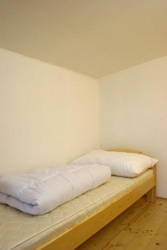 Postel nebo postele na pokoji v ubytování Penzion Apartmán Janov