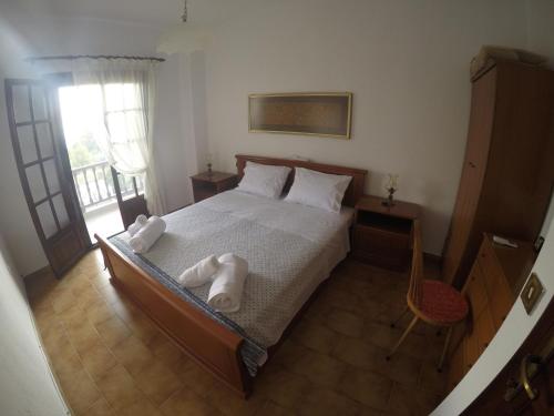 Ένα ή περισσότερα κρεβάτια σε δωμάτιο στο Dia's Home