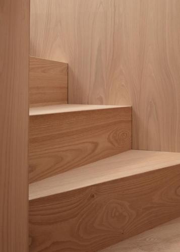 a wooden shelf in a room with wooden walls at Schgaguler Hotel in Castelrotto