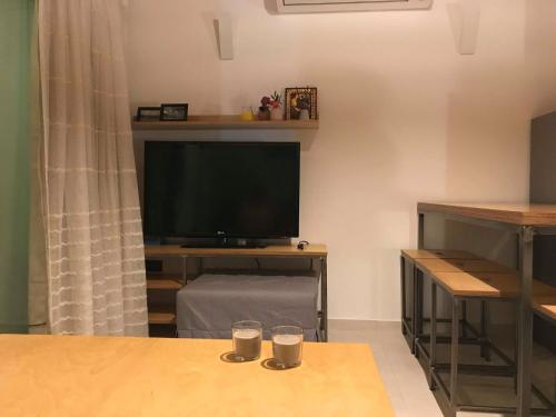 TV a/nebo společenská místnost v ubytování Eleni's house