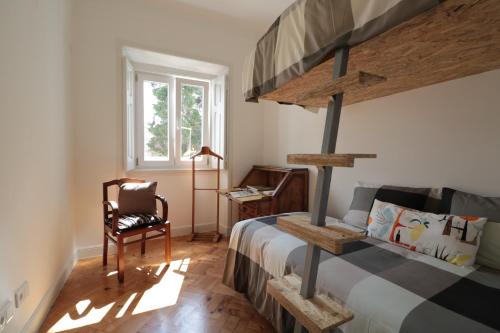 Postel nebo postele na pokoji v ubytování Casa d Sintra 2