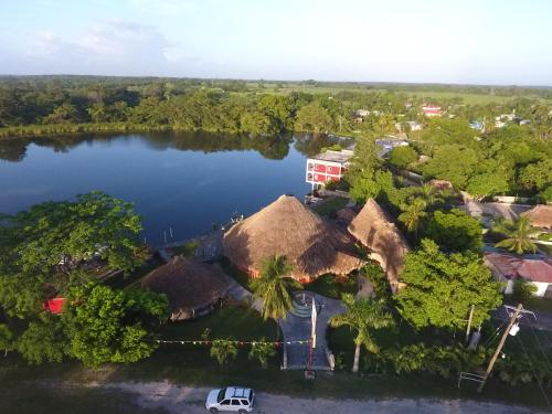 an aerial view of a resort on a lake at Lamanai Hotel & Marina in Orange Walk