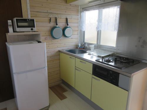 Cuisine ou kitchenette dans l'établissement Okinawa Freedom